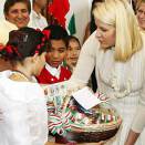The Crown Princess receives Mexican toys from the children who greeted her at the IVEC Cultural Centre in Veracruz (Photo: Lise Åserud, Scanpix)